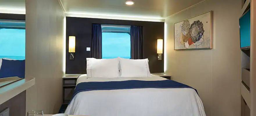 Cabine avec vue sur mer et grande baie vitrée